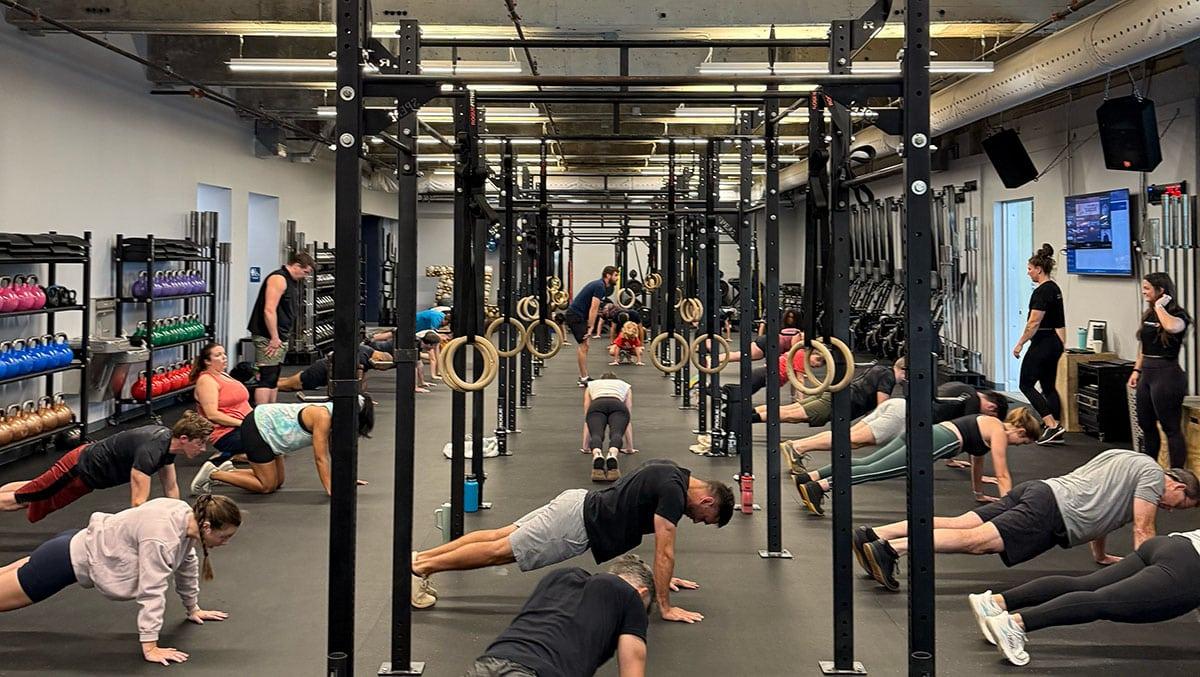 Man holding black barbell